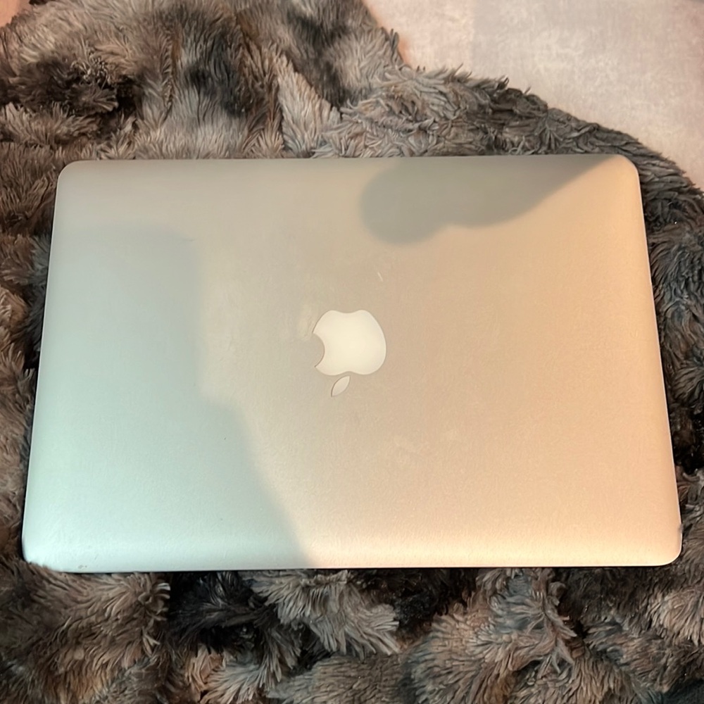 MacBook Pro w/ charger and case